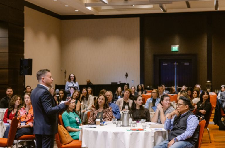 Life sciences workforce transformation professionals attending conference sessions
